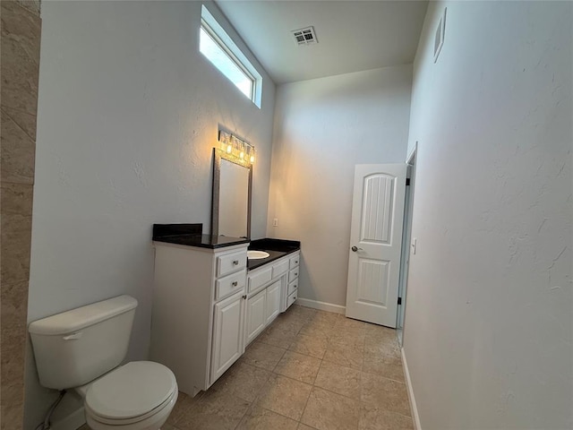 1016 Erinova Dr, Yukon, OK 73099 - bathroom featuring vanity and toilet