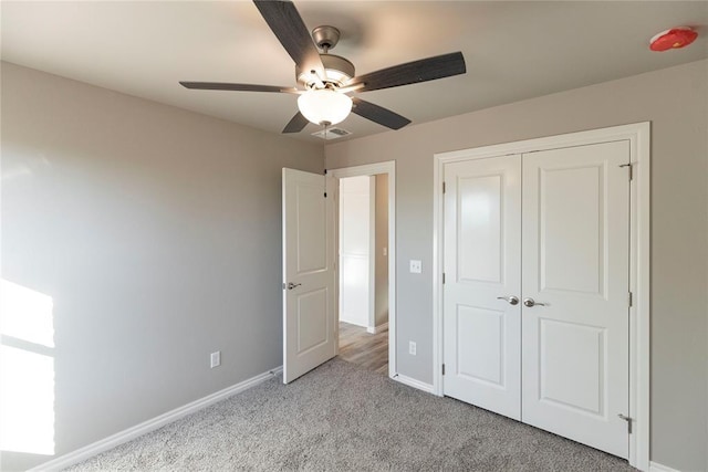 1624 NE 32nd St, Moore, OK 73160 - unfurnished bedroom featuring carpet floors, a closet, and ceiling fan
