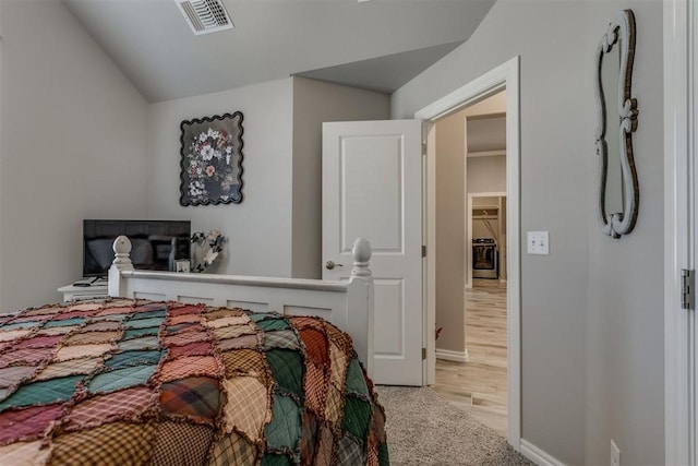 1624 NE 32nd St, Moore, OK 73160 - carpeted bedroom with vaulted ceiling and baseboards