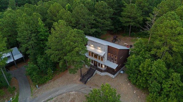 229 Sweet Gum Trl, Broken Bow, OK 74728 - view of subject property with a heavily wooded area