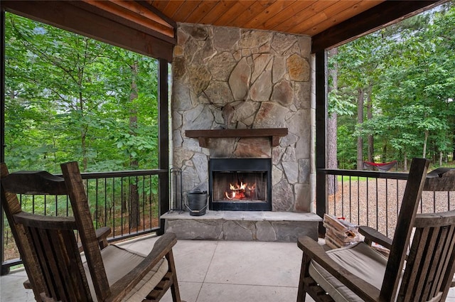229 Sweet Gum Trl, Broken Bow, OK 74728 - view of patio with an outdoor stone fireplace