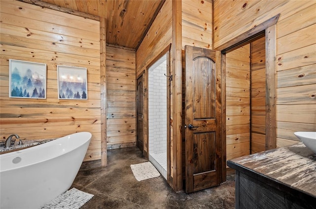 229 Sweet Gum Trl, Broken Bow, OK 74728 - full bathroom featuring wooden walls, a freestanding bath, wood ceiling, concrete floors, and vanity