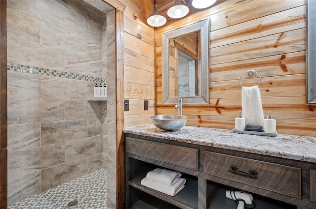 229 Sweet Gum Trl, Broken Bow, OK 74728 - full bath featuring vanity, a tile shower, and wooden walls