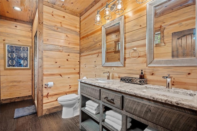 229 Sweet Gum Trl, Broken Bow, OK 74728 - bathroom with wooden walls, wood ceiling, double vanity, and wood finished floors