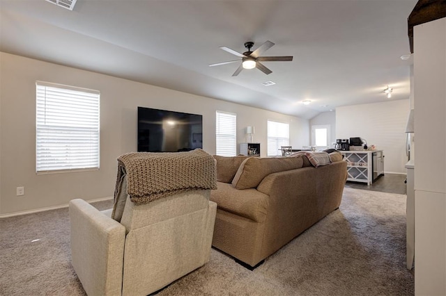 11725 Casey Dr, Yukon, OK 73099 - carpeted living room featuring vaulted ceiling and a ceiling fan