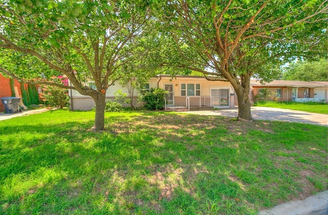 2317 N Redmond Ave, Bethany, OK 73008 - single story home with a front lawn and concrete driveway