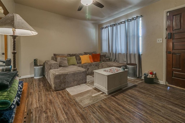 2317 N Redmond Ave, Bethany, OK 73008 - living area featuring a ceiling fan and dark wood-type flooring