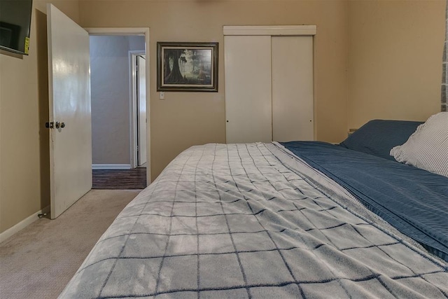 2317 N Redmond Ave, Bethany, OK 73008 - bedroom featuring carpet and a closet