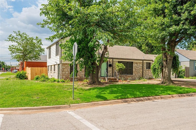 1200 NW 95th St, Oklahoma City, OK 73114 - view of front of house featuring stone siding and a front lawn