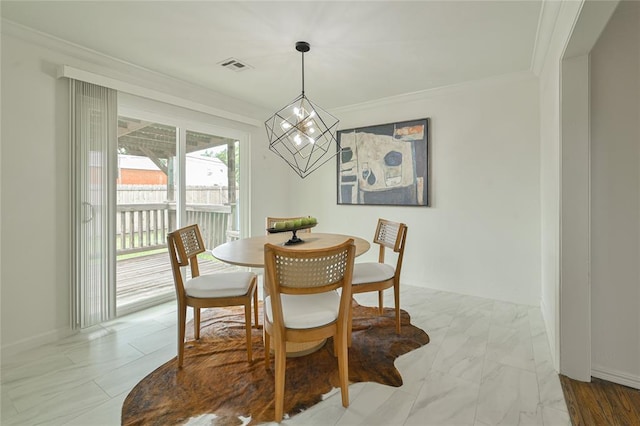 1200 NW 95th St, Oklahoma City, OK 73114 - dining room with a chandelier and crown molding