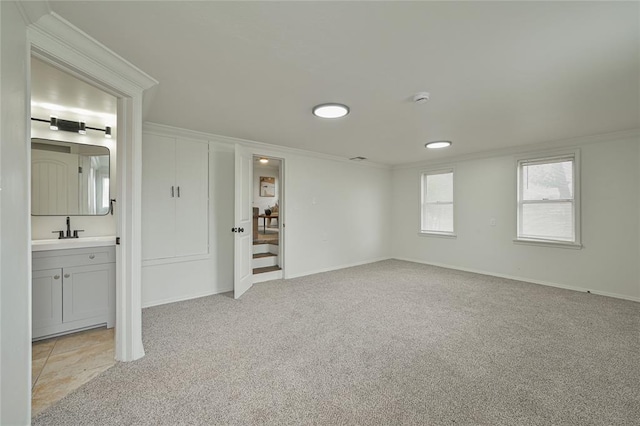 1200 NW 95th St, Oklahoma City, OK 73114 - basement featuring ornamental molding and light colored carpet