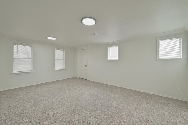 1200 NW 95th St, Oklahoma City, OK 73114 - below grade area with crown molding and light carpet