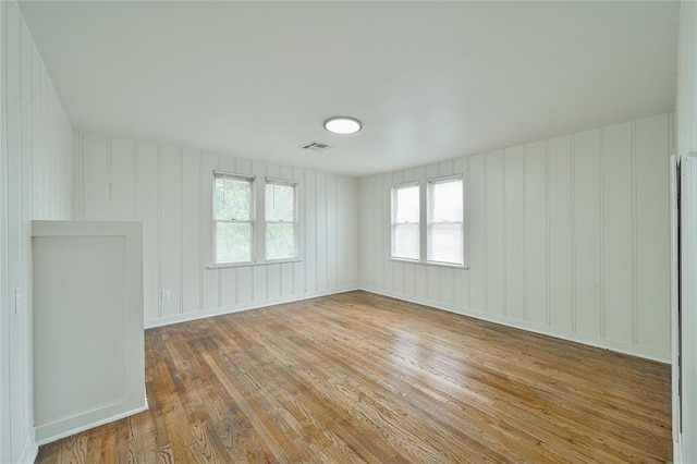 1200 NW 95th St, Oklahoma City, OK 73114 - spare room with hardwood / wood-style flooring