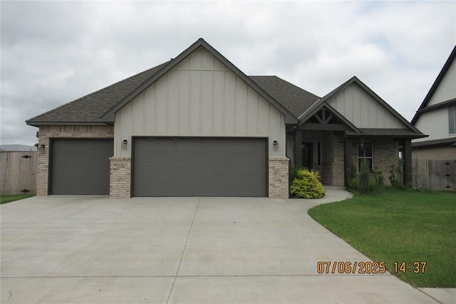3909 Sorano Dr, Moore, OK 73160 - craftsman house featuring brick siding, a garage, driveway, a shingled roof, and board and batten siding