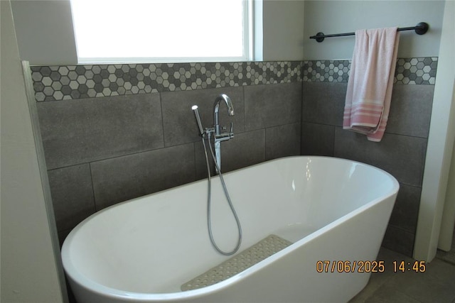 3909 Sorano Dr, Moore, OK 73160 - bathroom view of a freestanding tub and tile walls