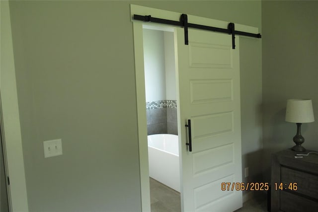 3909 Sorano Dr, Moore, OK 73160 - bedroom with a barn door