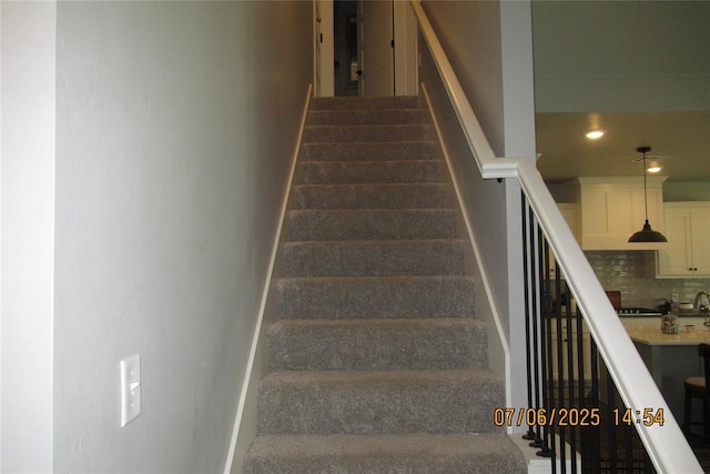 3909 Sorano Dr, Moore, OK 73160 - staircase featuring recessed lighting and baseboards