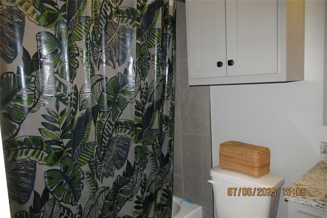 3909 Sorano Dr, Moore, OK 73160 - bathroom with toilet and shower / bathtub combination with curtain