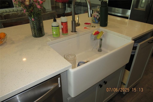 3909 Sorano Dr, Moore, OK 73160 - kitchen view of light countertops and stainless steel dishwasher