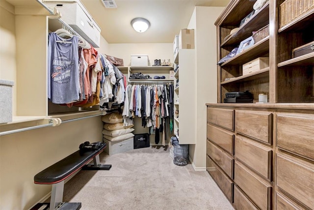 2803 Hidden Prairie Way, Edmond, OK 73013 - walk in closet featuring carpet floors