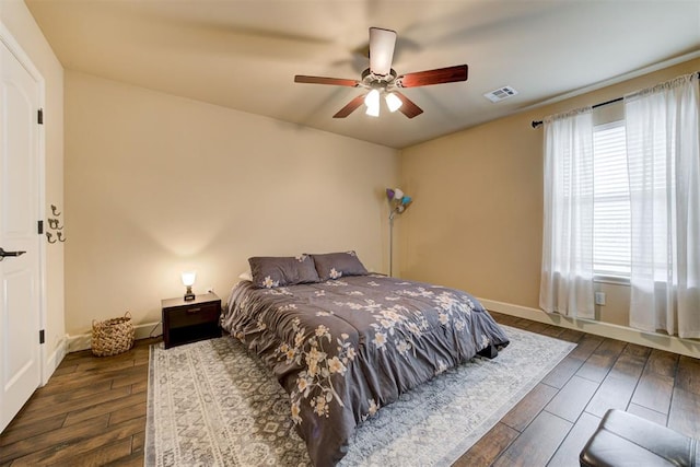 2803 Hidden Prairie Way, Edmond, OK 73013 - bedroom with wood finished floors and a ceiling fan