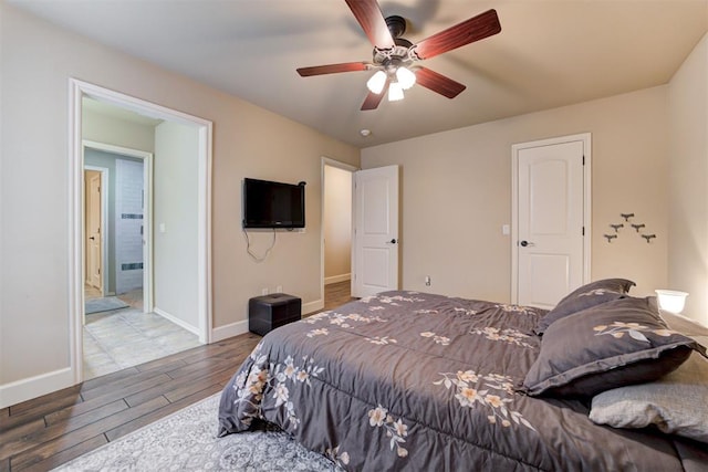 2803 Hidden Prairie Way, Edmond, OK 73013 - bedroom featuring wood finished floors and a ceiling fan