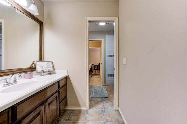 2803 Hidden Prairie Way, Edmond, OK 73013 - bathroom with vanity and baseboards
