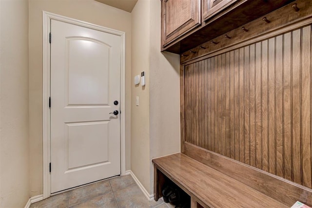 2803 Hidden Prairie Way, Edmond, OK 73013 - mudroom featuring light tile patterned floors and baseboards