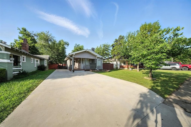 1530 NW 32nd St, Oklahoma City, OK 73118 - bungalow featuring covered porch and concrete driveway