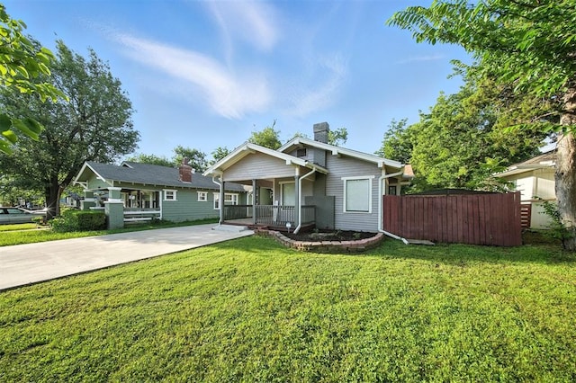 1530 NW 32nd St, Oklahoma City, OK 73118 - bungalow-style house featuring a porch, a chimney, and driveway