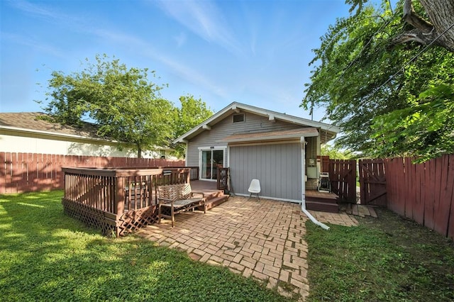 1530 NW 32nd St, Oklahoma City, OK 73118 - rear view of house featuring a fenced backyard and a deck