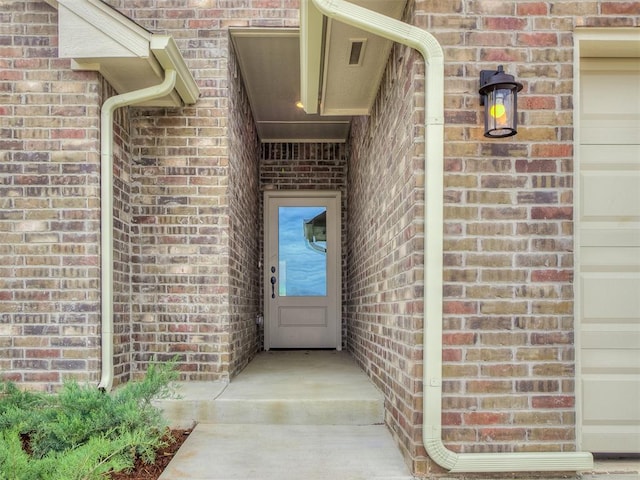 600 Mirano Ln, Edmond, OK 73034 - property entrance featuring brick siding
