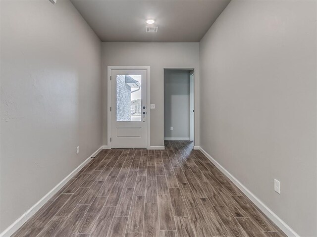 600 Mirano Ln, Edmond, OK 73034 - foyer featuring wood finished floors and baseboards