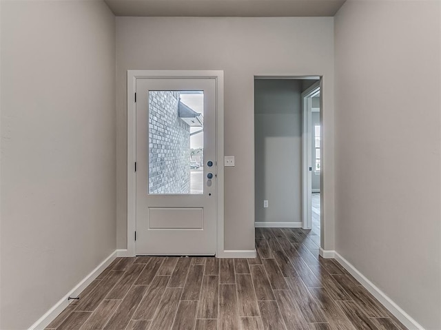 600 Mirano Ln, Edmond, OK 73034 - foyer featuring dark wood finished floors and healthy amount of natural light