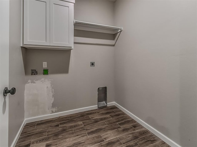 600 Mirano Ln, Edmond, OK 73034 - washroom featuring hookup for an electric dryer, dark wood finished floors, and cabinet space