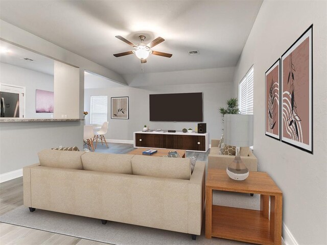 11104 NW 99th St, Yukon, OK 73099 - living room with wood finished floors and ceiling fan