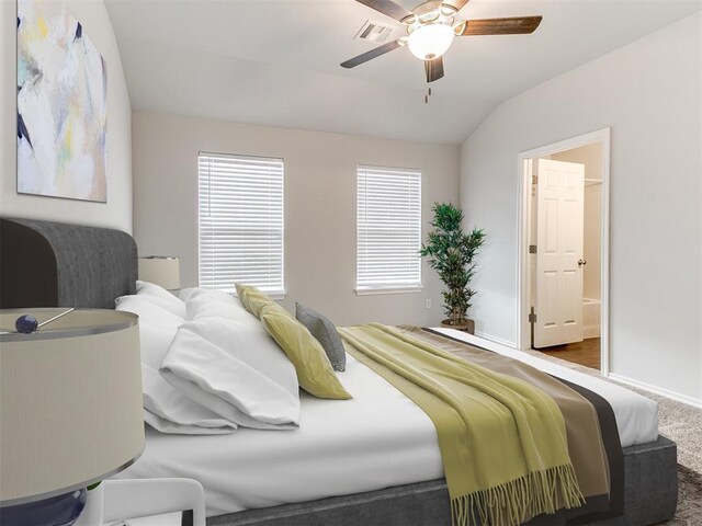 11104 NW 99th St, Yukon, OK 73099 - bedroom with carpet flooring, vaulted ceiling, and a ceiling fan