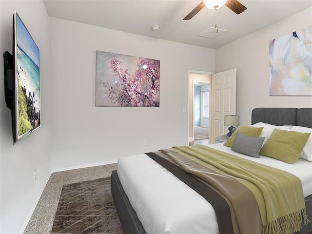 11104 NW 99th St, Yukon, OK 73099 - carpeted bedroom featuring baseboards and a ceiling fan