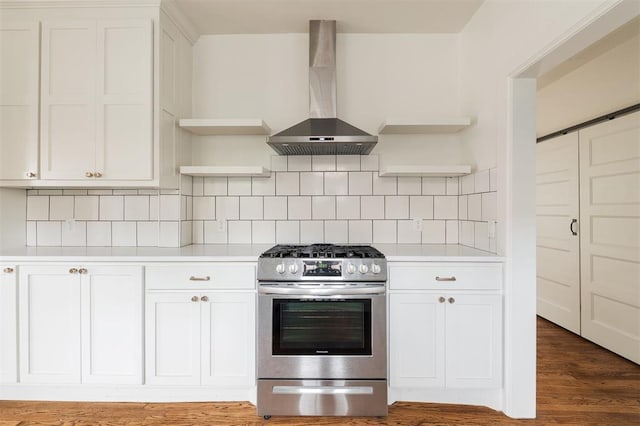 826 NE 18th St, Oklahoma City, OK 73105 - kitchen featuring stainless steel gas stove, wall chimney exhaust hood, open shelves, and light countertops
