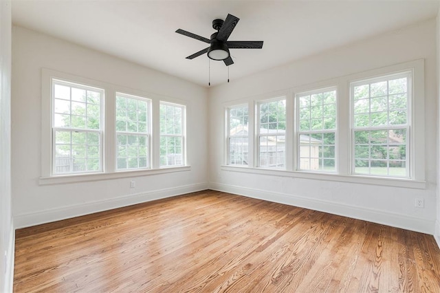 826 NE 18th St, Oklahoma City, OK 73105 - spare room with light wood-style flooring and ceiling fan