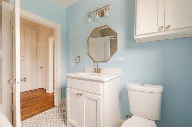 826 NE 18th St, Oklahoma City, OK 73105 - bathroom with vanity and wood finished floors