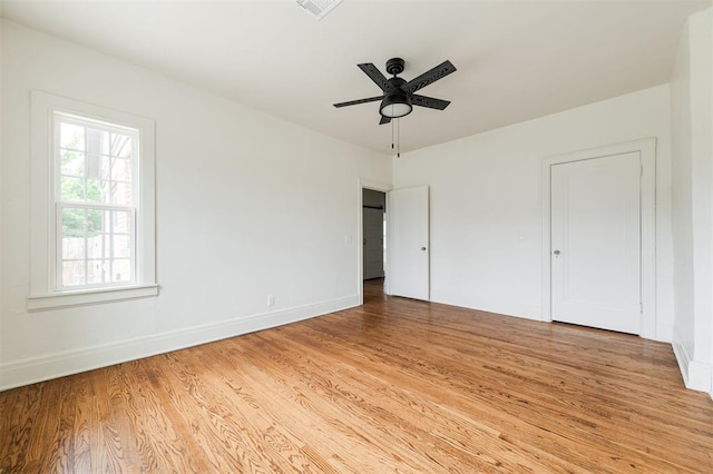 826 NE 18th St, Oklahoma City, OK 73105 - unfurnished bedroom featuring light wood finished floors and ceiling fan