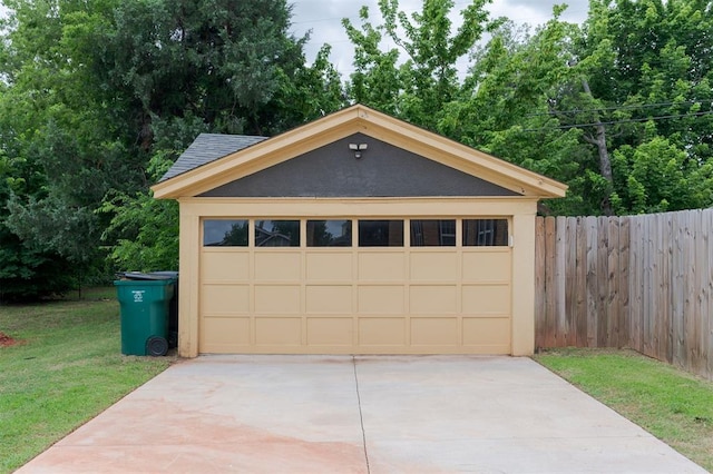 826 NE 18th St, Oklahoma City, OK 73105 - garage featuring concrete driveway