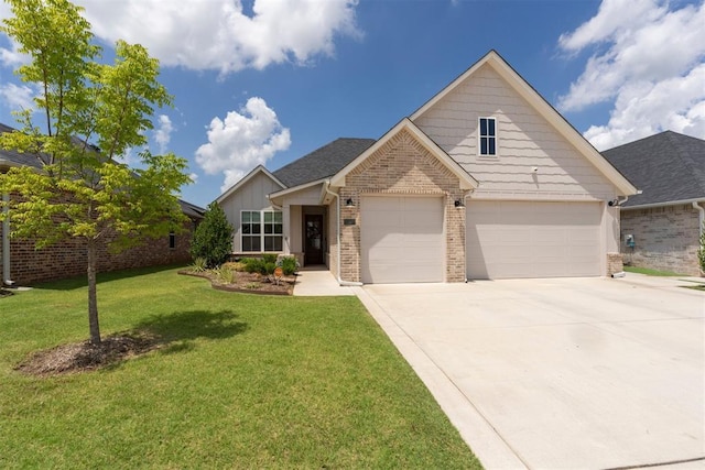 209 Pont Neuf Ct, Edmond, OK 73034 - view of front facade with brick siding, concrete driveway, a front lawn, and an attached garage