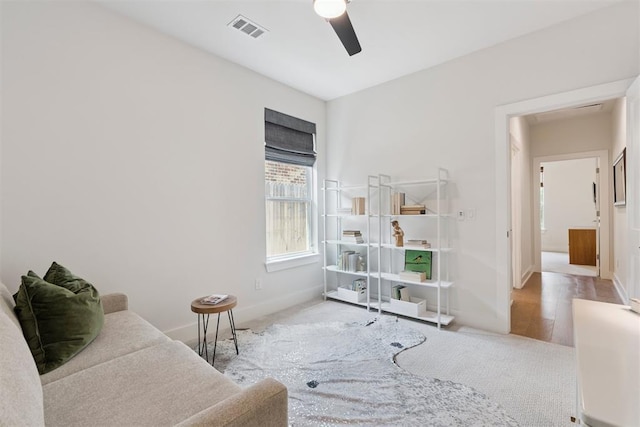 209 Pont Neuf Ct, Edmond, OK 73034 - living area with carpet and ceiling fan
