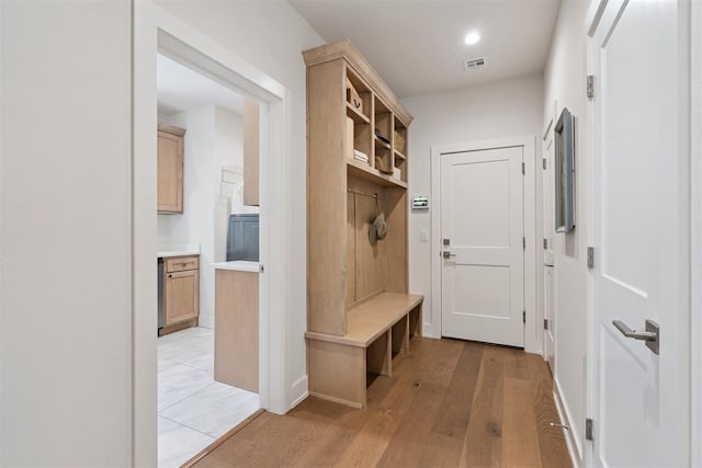 209 Pont Neuf Ct, Edmond, OK 73034 - mudroom with light wood-style flooring and recessed lighting