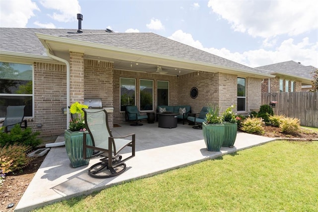 209 Pont Neuf Ct, Edmond, OK 73034 - rear view of house with an outdoor hangout area, brick siding, ceiling fan, and a shingled roof