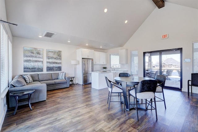 209 Pont Neuf Ct, Edmond, OK 73034 - dining space featuring high vaulted ceiling, beamed ceiling, dark wood-type flooring, and recessed lighting