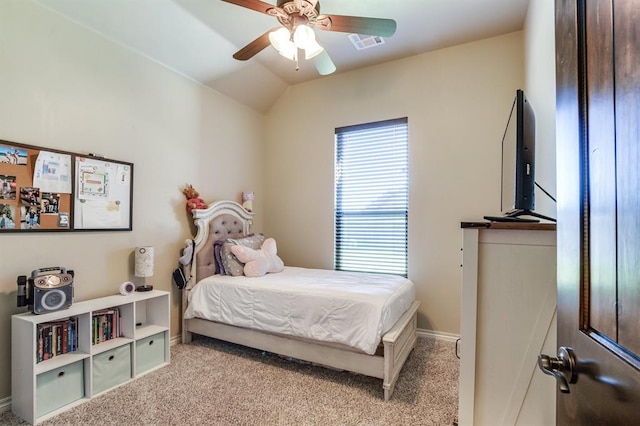 10812 Wild Horse Creek Dr, Yukon, OK 73099 - carpeted bedroom with vaulted ceiling and a ceiling fan