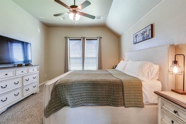 10812 Wild Horse Creek Dr, Yukon, OK 73099 - carpeted bedroom featuring lofted ceiling and ceiling fan